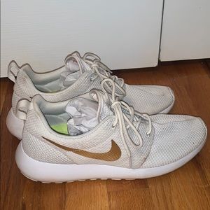 Slightly used custom gold and white Nike sneakers